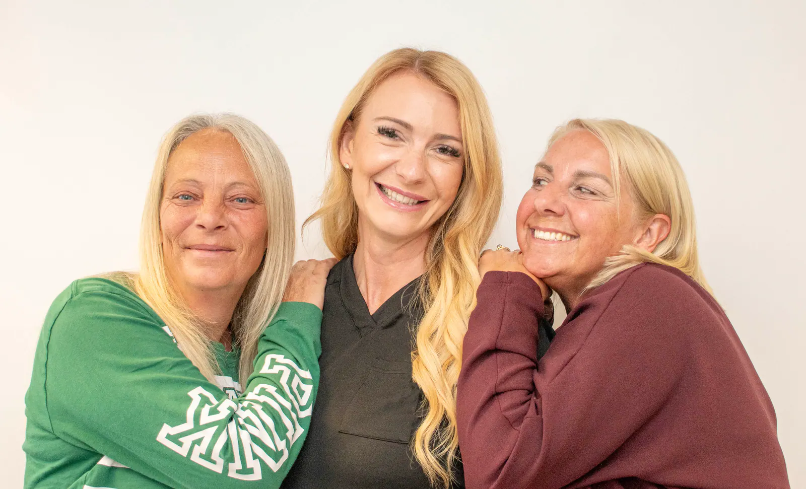 Kelly with clients at KM Skin and Laser Clinic.