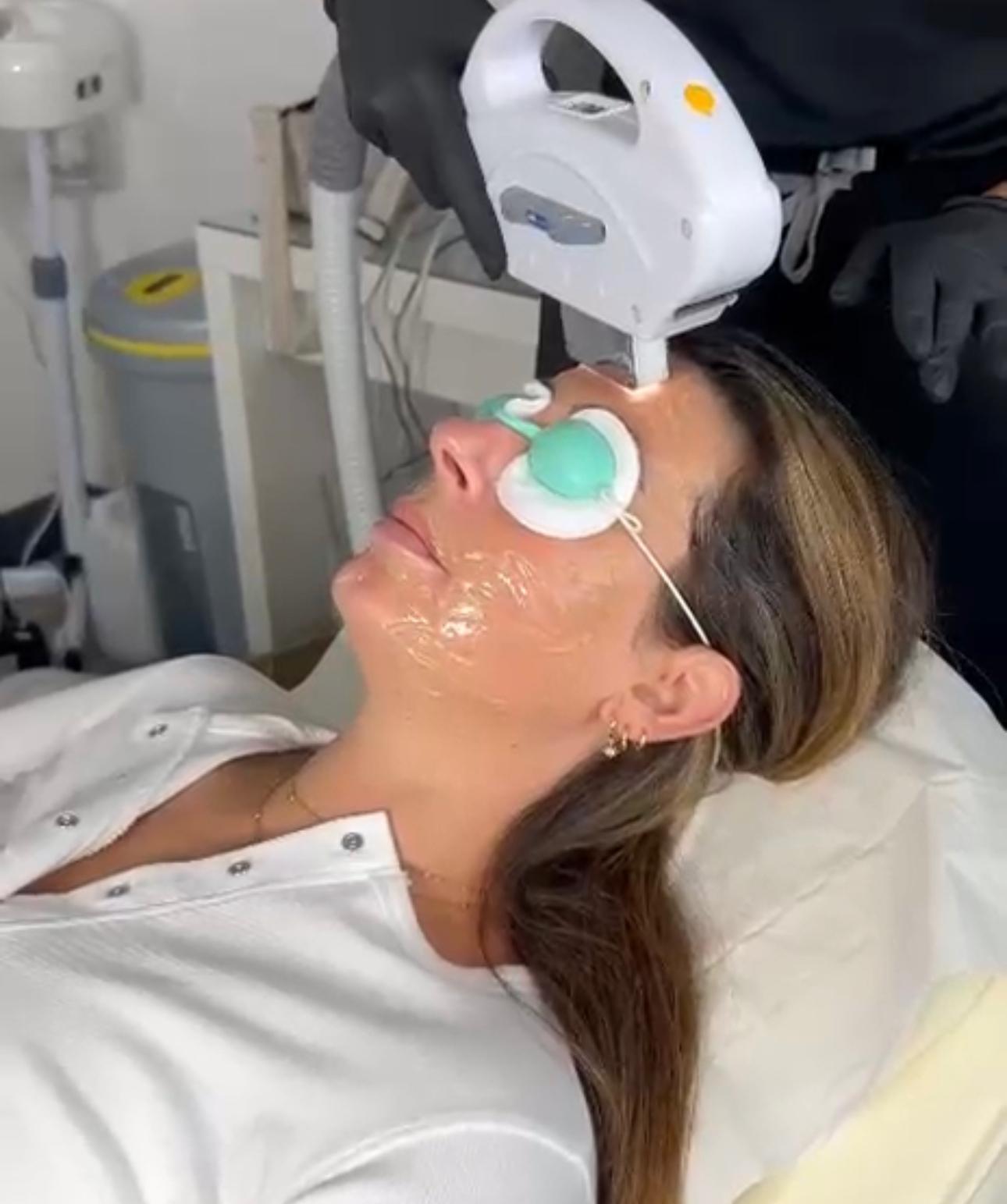 An IPL skin rejuvenation treatment being carried out in the clinic.